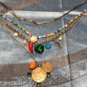 Four layer necklace with fun charms
